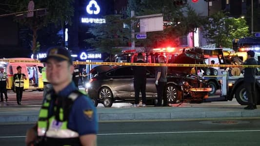 Car drives into crowd near Seoul city hall, 9 dead