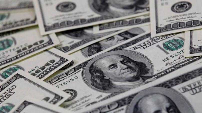 Dollar pauses after losses as investors seek fresh clues on U.S. economy