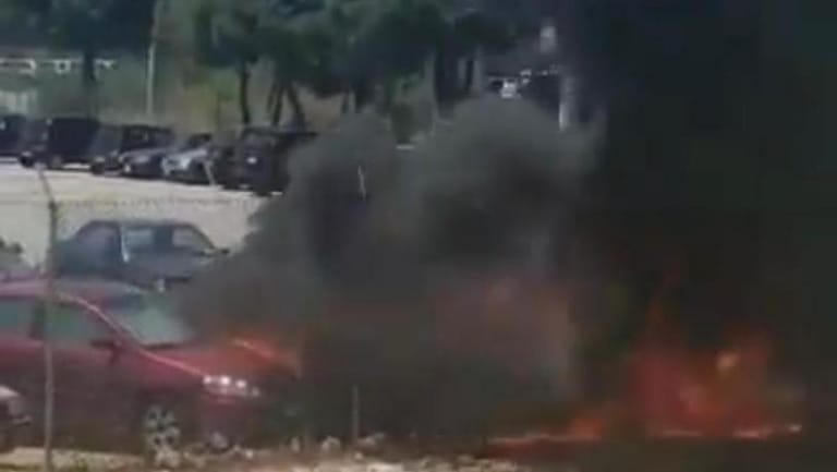 Photo: Car catches fire inside Beirut airport premises