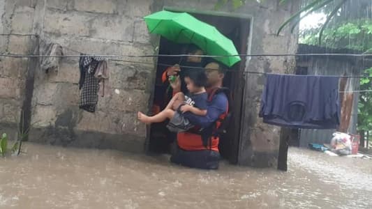 Philippines floods force tens of thousands to flee homes