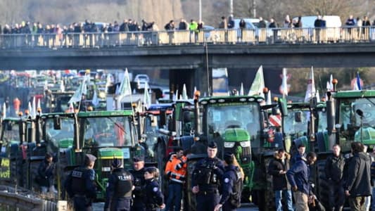 AFP: French farmers' unions call for end to nationwide road blockades