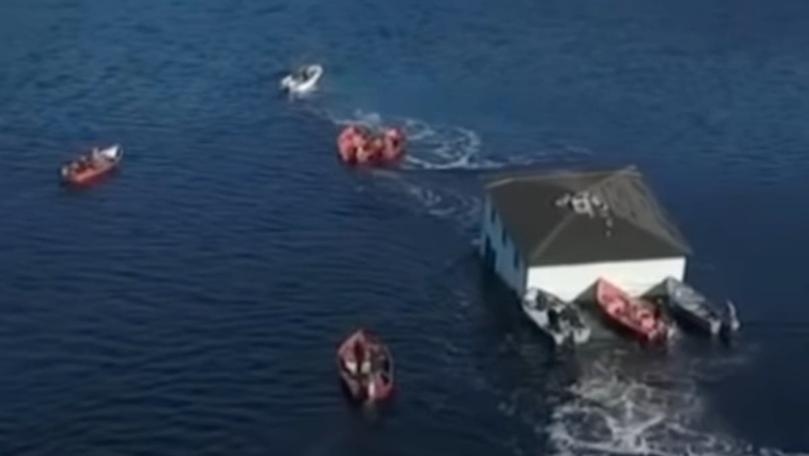 Photos: Canadian Couple Float Their 100-Year-Old Dream House to New Spot Across Bay