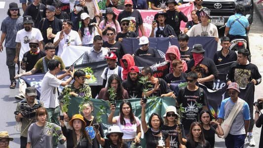 Cannabis advocates in Thailand protest a proposal to ban again its general use