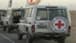 Red Cross vehicles arrived at the site for receiving the bodies of 4 Israeli hostages