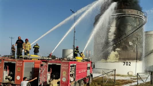 Photo: Firefighters attempt to extinguish Zahrani oil installations fire