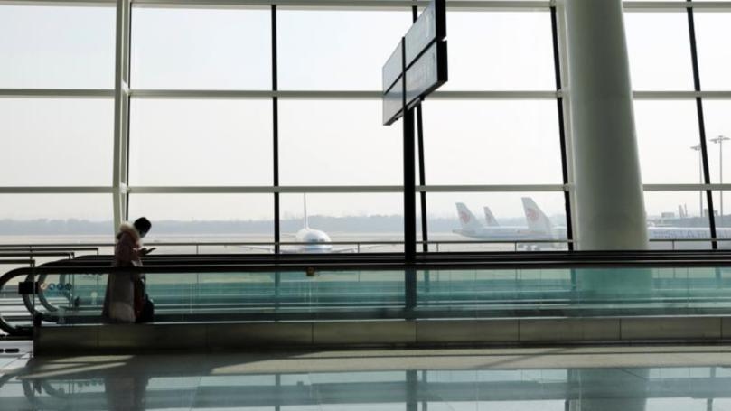 China temporarily bars entry of foreigners travelling from Canada