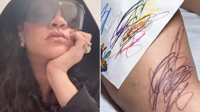 ريهانا تكشف عن وشم كبير مرسوم بخطوط عشوائية "صمّمه أطفالها"