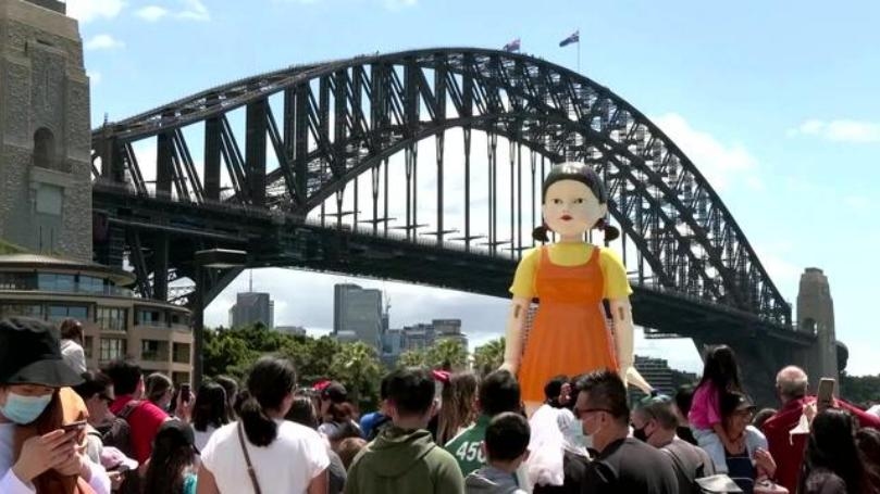 Enormous Squid Game Doll Appears in Sydney for Halloween