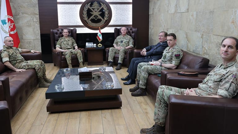 Amry Commander leads a series of meetings
