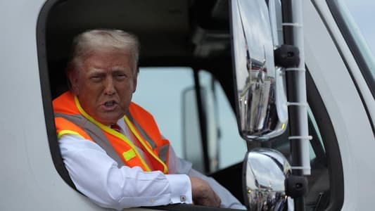 Watch: Trump Rides Garbage Truck in Stunt to Trash Biden