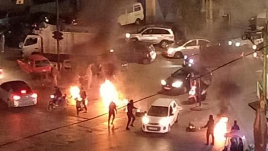Photos: Some protesters burn tires between Chiyah and Ain el-Remmaneh