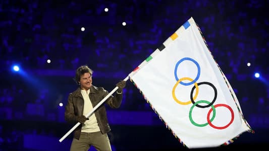 Tom Cruise Hands Olympic Flag to LA, Closing Paris Games