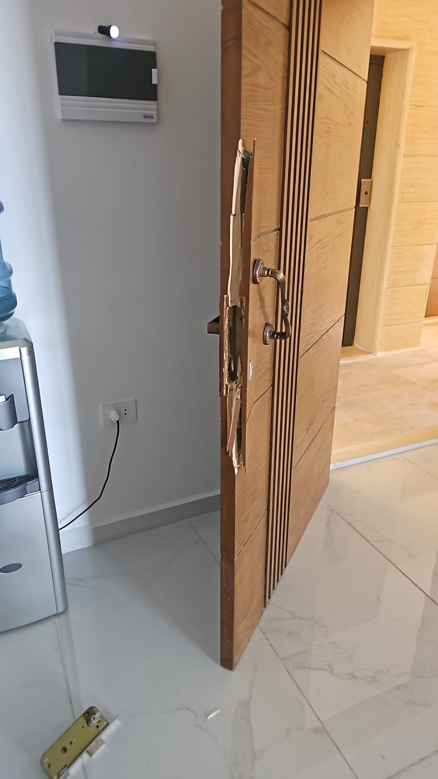 Photos: Commercial Building Robbed, ISIS Slogans Left on the Walls