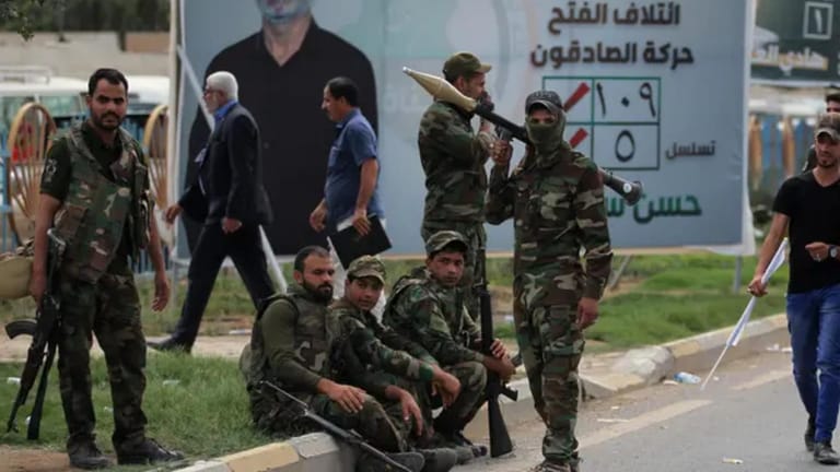 فصائل عراقية مدعومة من إيران تبدي استعدادها لتسليم السلاح