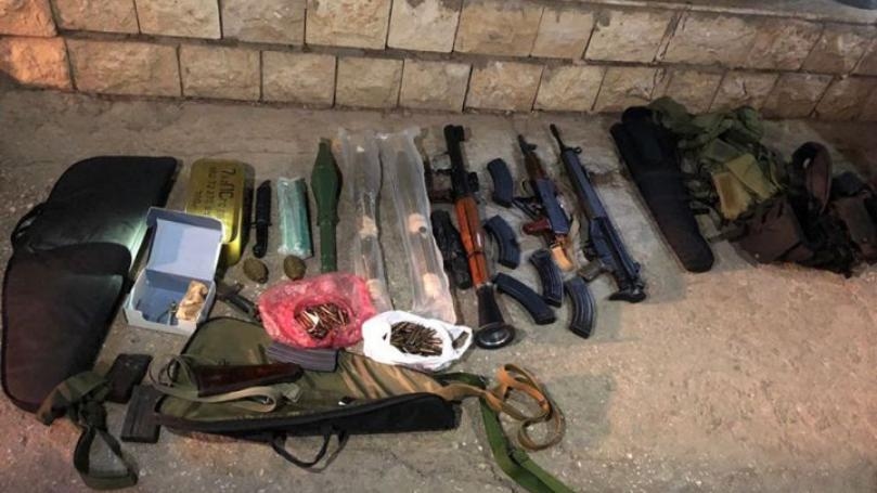 ذخائر وأعتدة عسكرية في منزلي مطلوبين