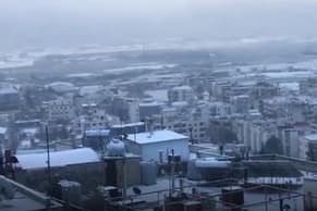 Watch: Lebanese Rooftops Blanketed in White