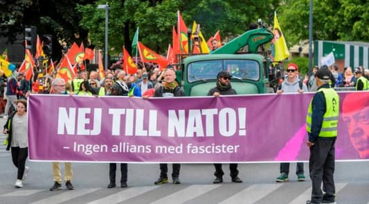 Hundreds protest Sweden's new anti-terror laws