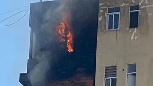 Photo: An apartment caught fire inside a residential building in Zalka