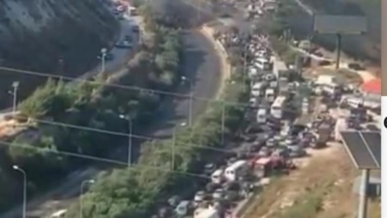 NNA: Protesters have blocked two lanes of the highway near Hamat tunnel to the North with burning tires