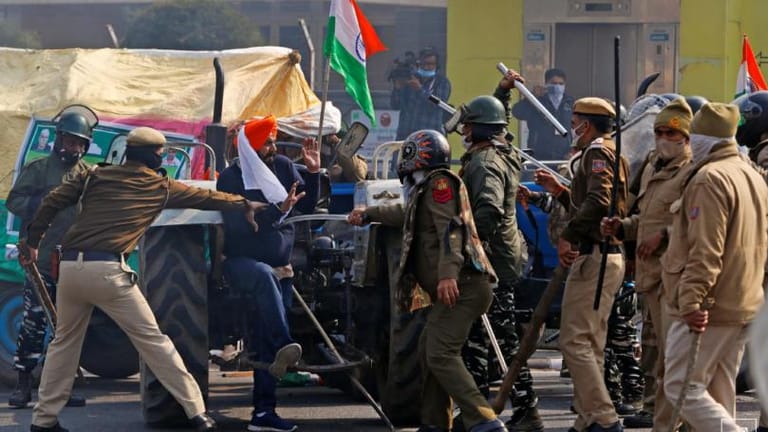 Indian police fire tear gas in clash with farmers on Republic Day