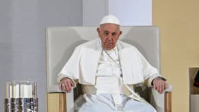 Caution urged as ailing pope records slight improvement