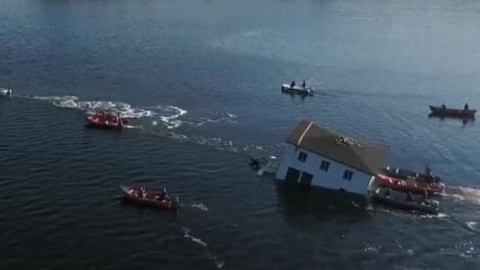 Photos: Canadian Couple Float Their 100-Year-Old Dream House to New Spot Across Bay