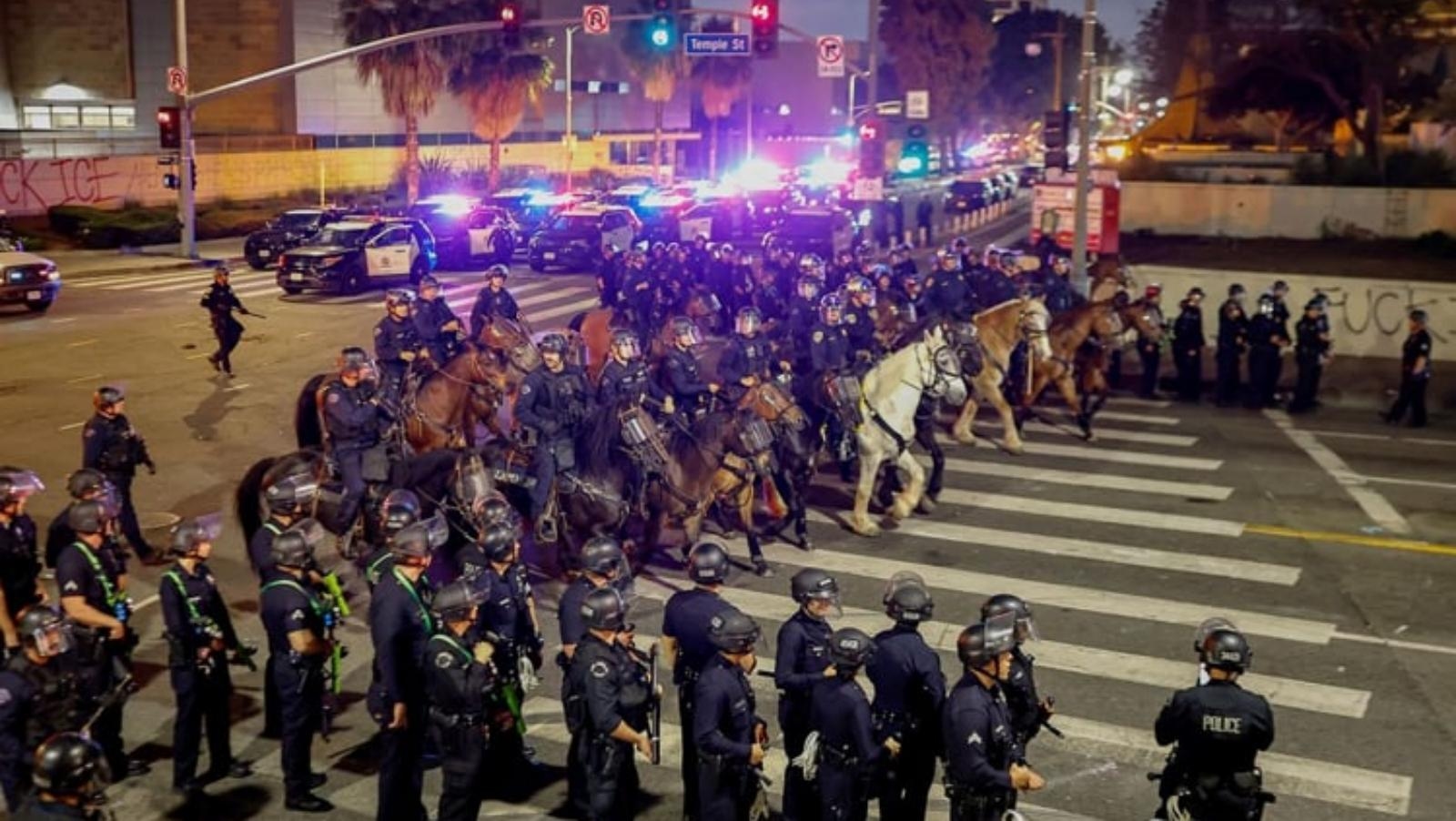 AFP: LA police say arrests underway as protesters defy curfew
