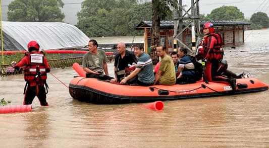 Tropical storm rains batter China for seventh day