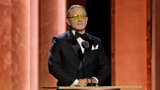 Daniel Craig mentions the James Bond hero at the Governors Awards