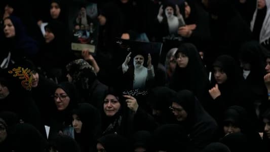 Iran's supreme leader presides over funeral for president and others killed in helicopter crash