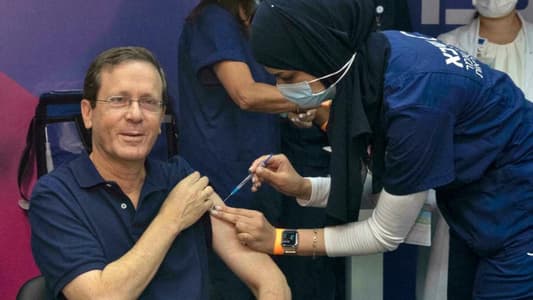 AFP: Israel's President Herzog gets third Covid vaccine dose
