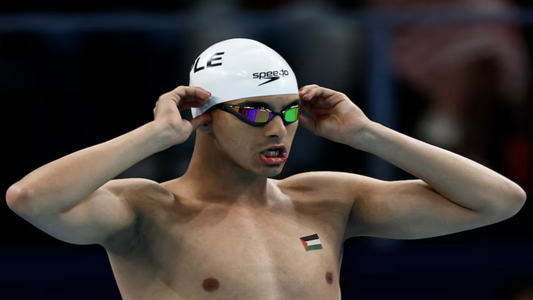 Palestinian swimmer Yazan Al Bawwab flies the flag in Paris pool