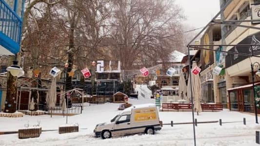 Snow covers Ehden’s landmarks, strong winds damage power lines