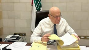 Photo: Mikati prepares for the Cabinet session in his office