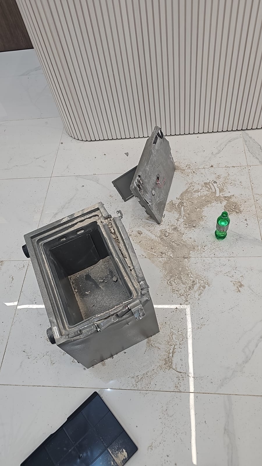 Photos: Commercial Building Robbed, ISIS Slogans Left on the Walls