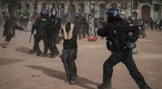 French minister says 123 police injured in protests, 80 people arrested