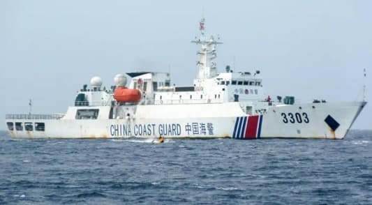 China's military says US warship illegally entered waters in South China Sea