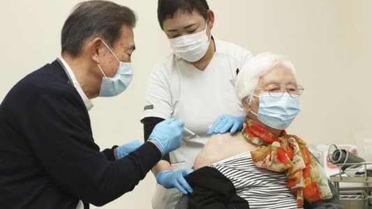 Japan begins COVID-19 shots for over 65s as fourth infection wave looms
