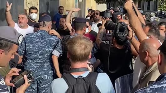 Confrontations between “Freedom March” participants and a group of young men at Martrys', Riad al-Solh Squares