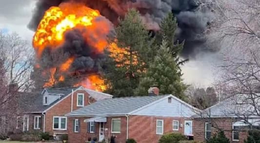 Overturned gas tanker carrying flammable liquids explodes on highway in Maryland, killing 1 person