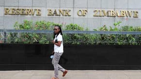 Zimbabwe fines businesses ignoring new exchange rate