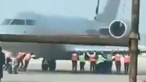 Watch: Airport staff push plane by hand