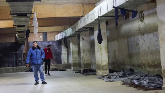 Freed Syrian prisoners return to their 'death dormitory'