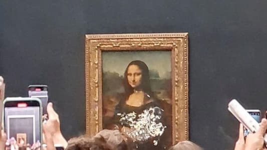 Mona Lisa Left Unharmed but Smeared in Cream in Climate Protest Stunt