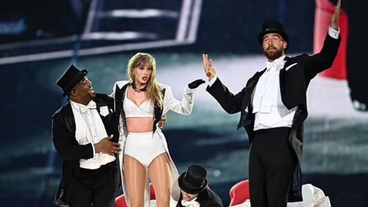 Taylor Swift brings Travis Kelce on stage for the first time
