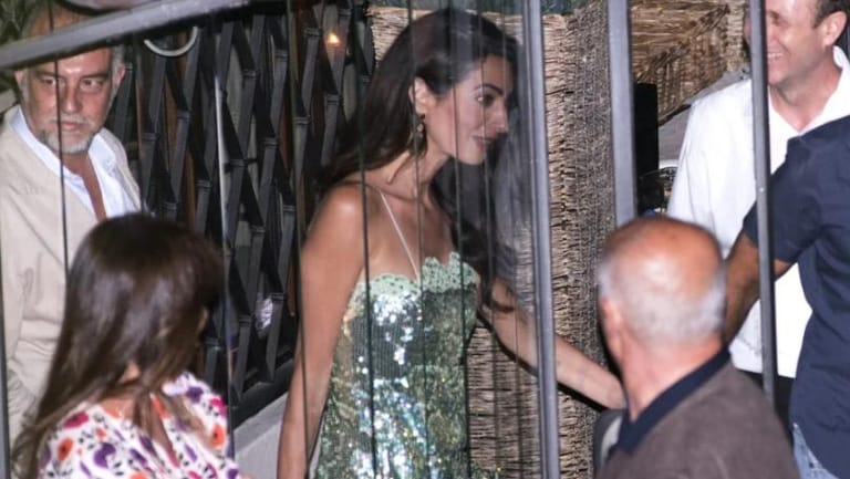 Amal Clooney shimmers in green sequins for night out with George Clooney in Italy