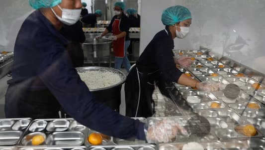 Indonesia dishes out first free meals in programme targeting 83 million people