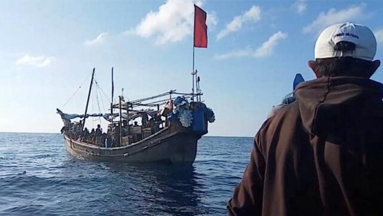 Indonesia says will allow stranded Rohingya boat to seek refuge