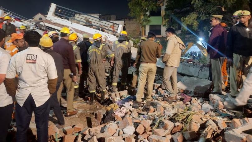 Twelve rescued after building collapses in India; more feared trapped