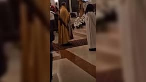 Watch: Priest Holding a Weapon